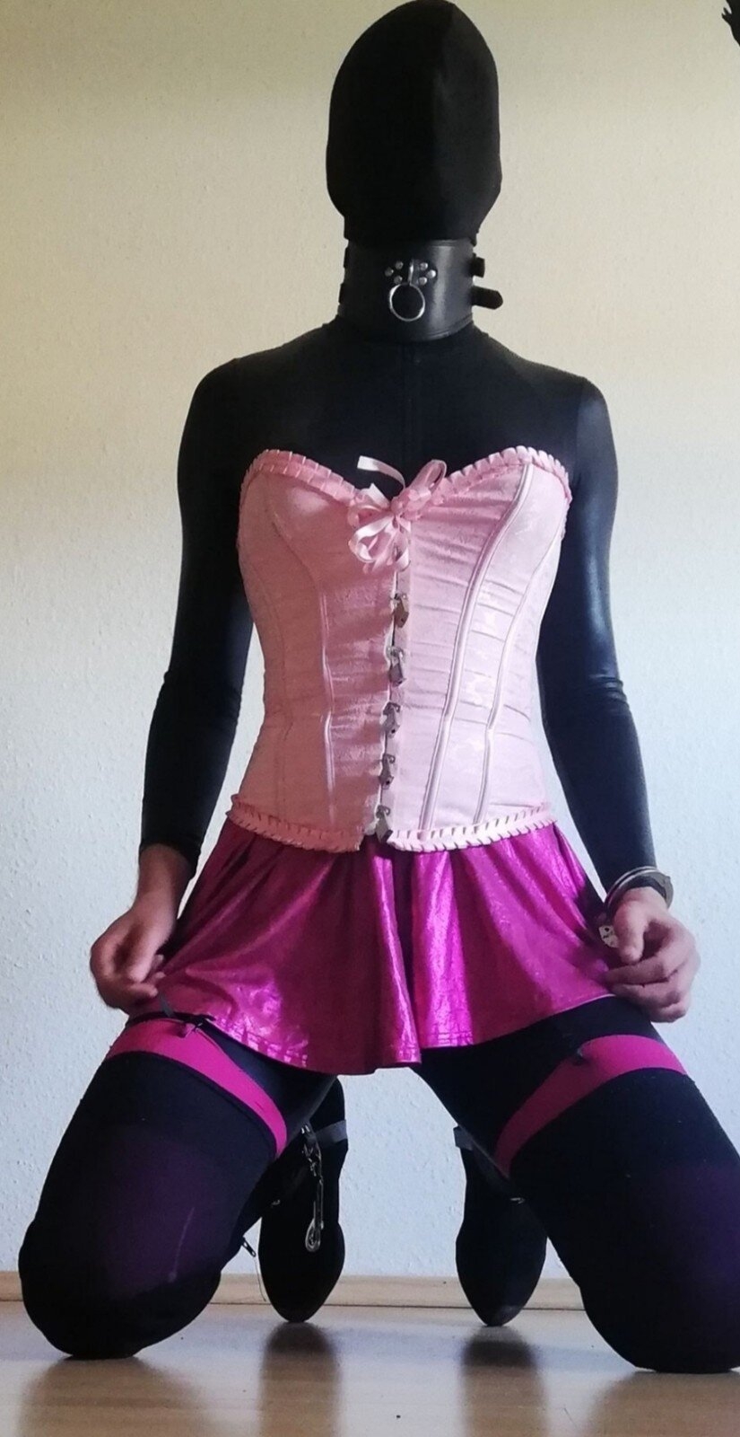 Sissy slut in corset miniskirt