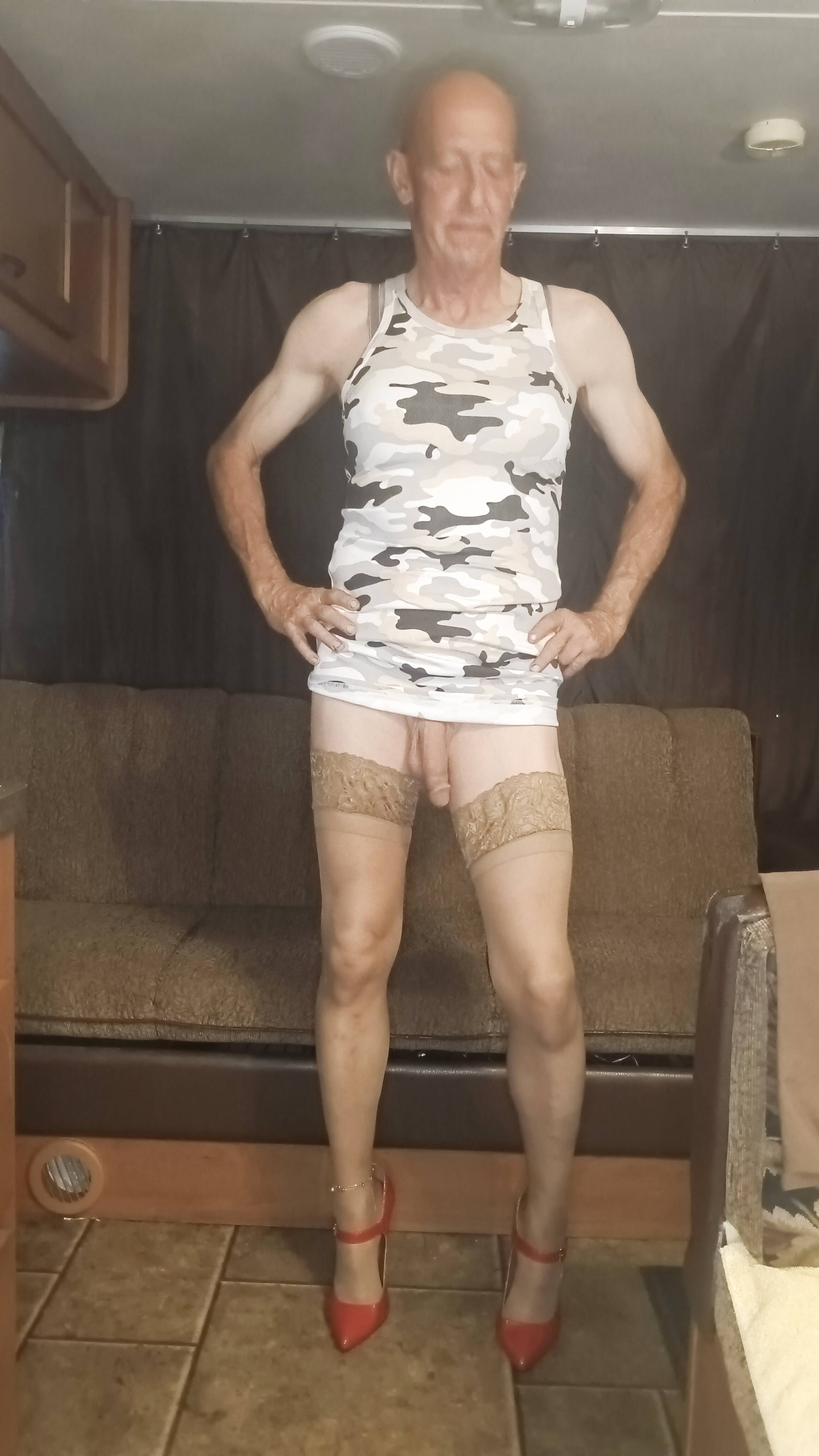 Faggot Andrew Brown in Camo Dress