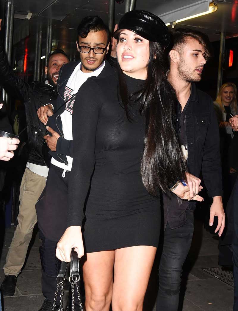 Marnie Simpson Braless in See Through Black Dress