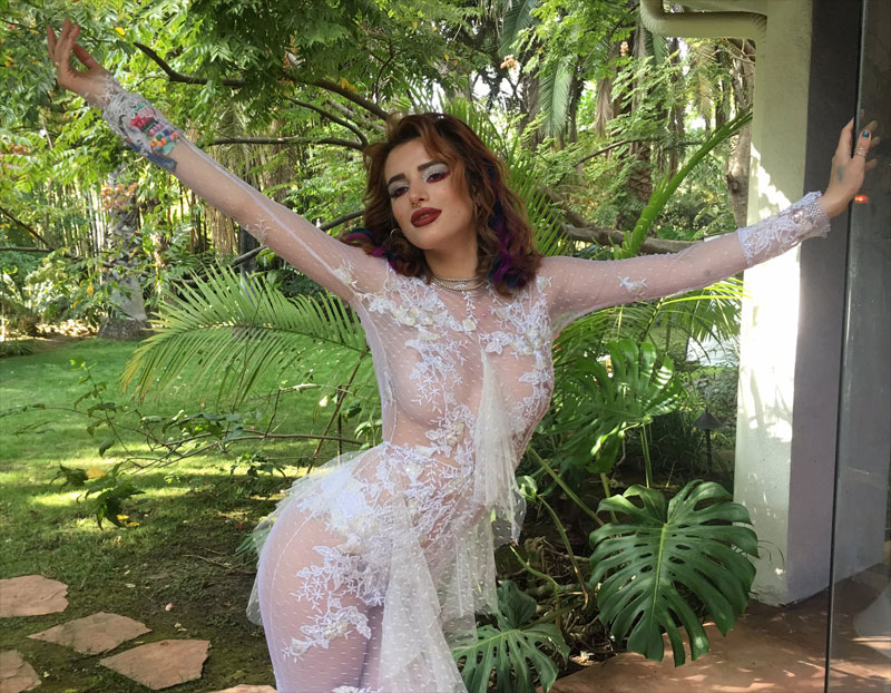 Bella Thorne No Bra in White Lace Dress