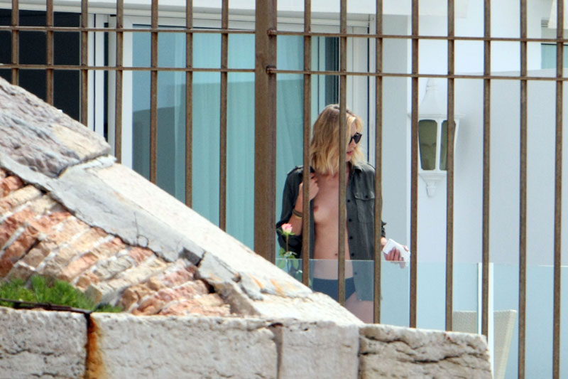 Anja Rubik Caught Topless on her Patio