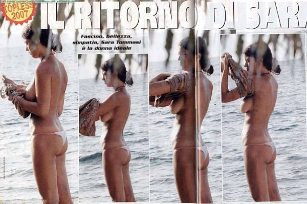 Sara Tommasi Topless In A Beach Changing Moment
