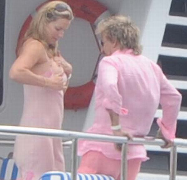 Rod Stewart Goes For Penny Lancasters Tit. Click Link Below For Gallery