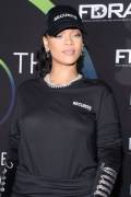Rihanna Braless in See Through Black Top