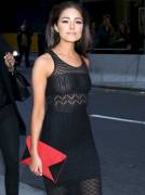 Olivia Culpo Braless in See Through Dress