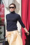 Victoria Beckham in Sheer Black Turtleneck Sweater