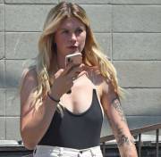 Ireland Baldwin No Bra in Black Bodysuit