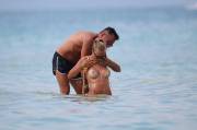 Laura Cremaschi Loses her Bikini Top in the Surf