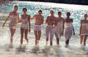 VS Models Get Topless, Wet and Dirty for Vogue Spain
