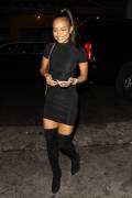 Karrueche Tran Braless in See Through Black Top