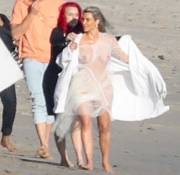Kim Kardashian Breasts in See Through Lace Robe