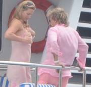 Rod Stewart Goes For Penny Lancasters Tit. Click Link Below For Gallery